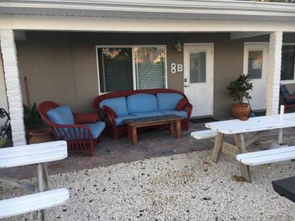 A picture containing ground, building, window, living

Description automatically generated